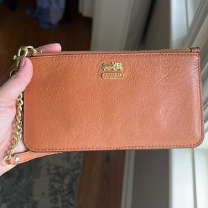 Coach Brown Wristlet With Gold Chain, barely used.